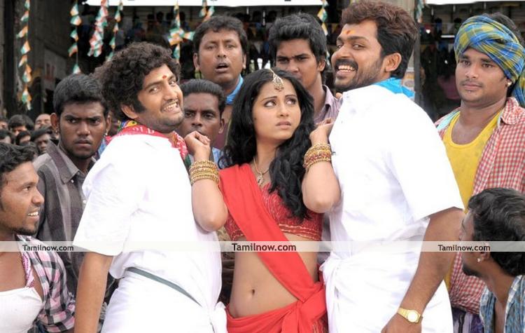 Karthi And Santhanam In Siruthai 10