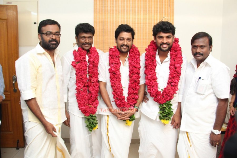 Director Karupazhaniappans Jannalooram Pooja Stills 12